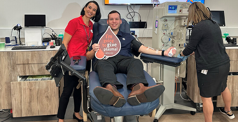 Lifeblood's Gwendolyne Camaret with Councillor Brodie Phillips at his plasma donation.