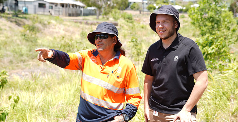 Cr Brodie Phillips and Council Construction Team Leader Angus Cook inspecting the award-winning Bushland Beach Channel Naturalisation project.