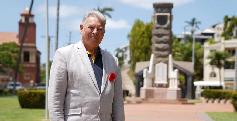 Deputy Mayor Paul Jacob dons a poppy for Remembrance Day at Anzac Park.